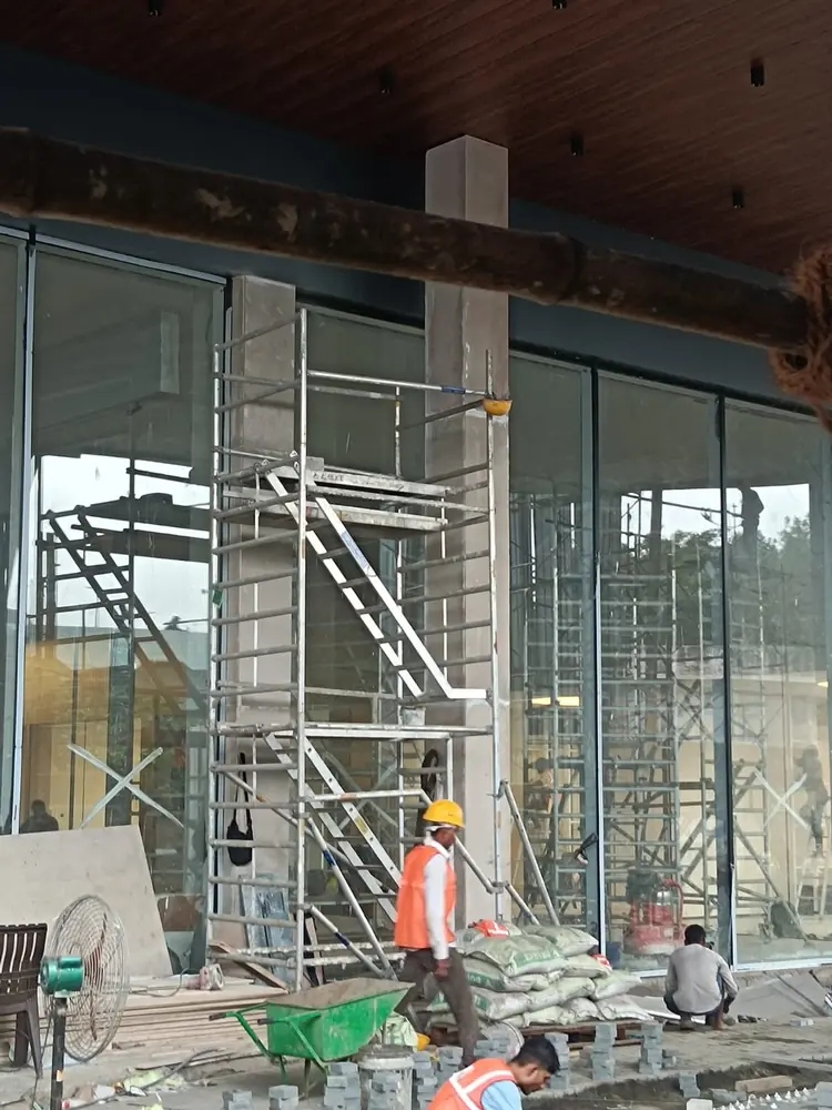 Mobile aluminium scaffold installed at a Mumbai building entrance