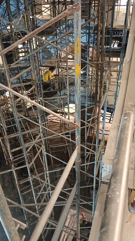 Dense scaffolding framework assembled between buildings