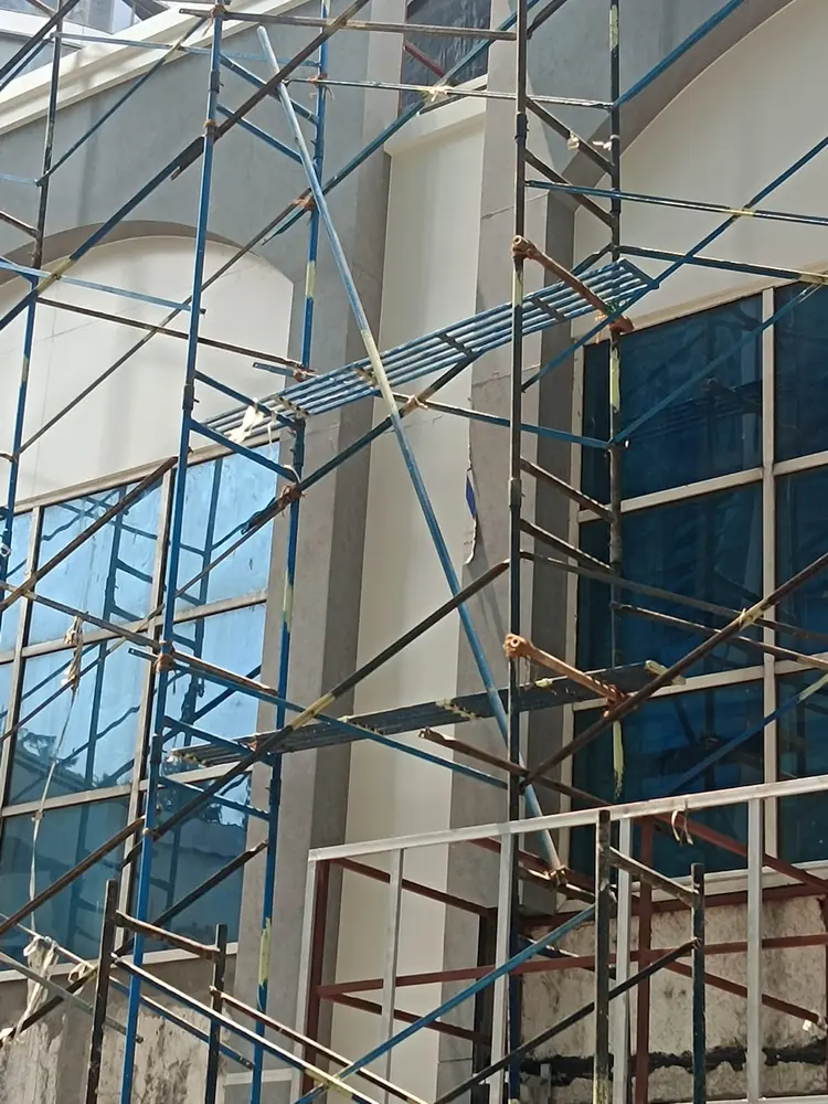 Scaffolding providing access to a glass building façade