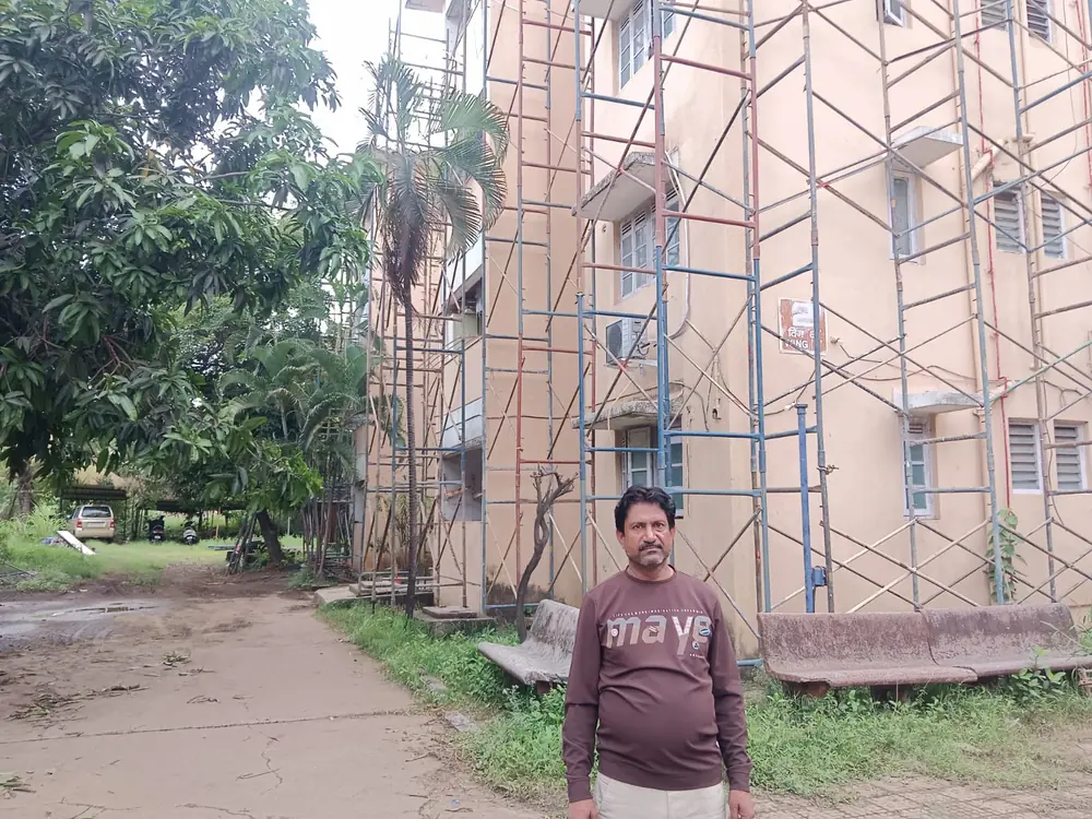 Scaffolding worker beside an installed access structure